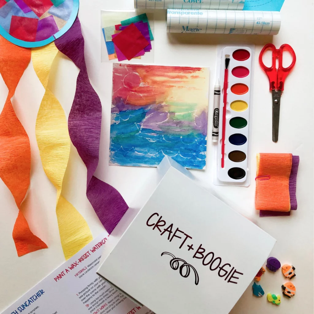Craft and Boogie kit with colored paper, paints, brushes and scissors.