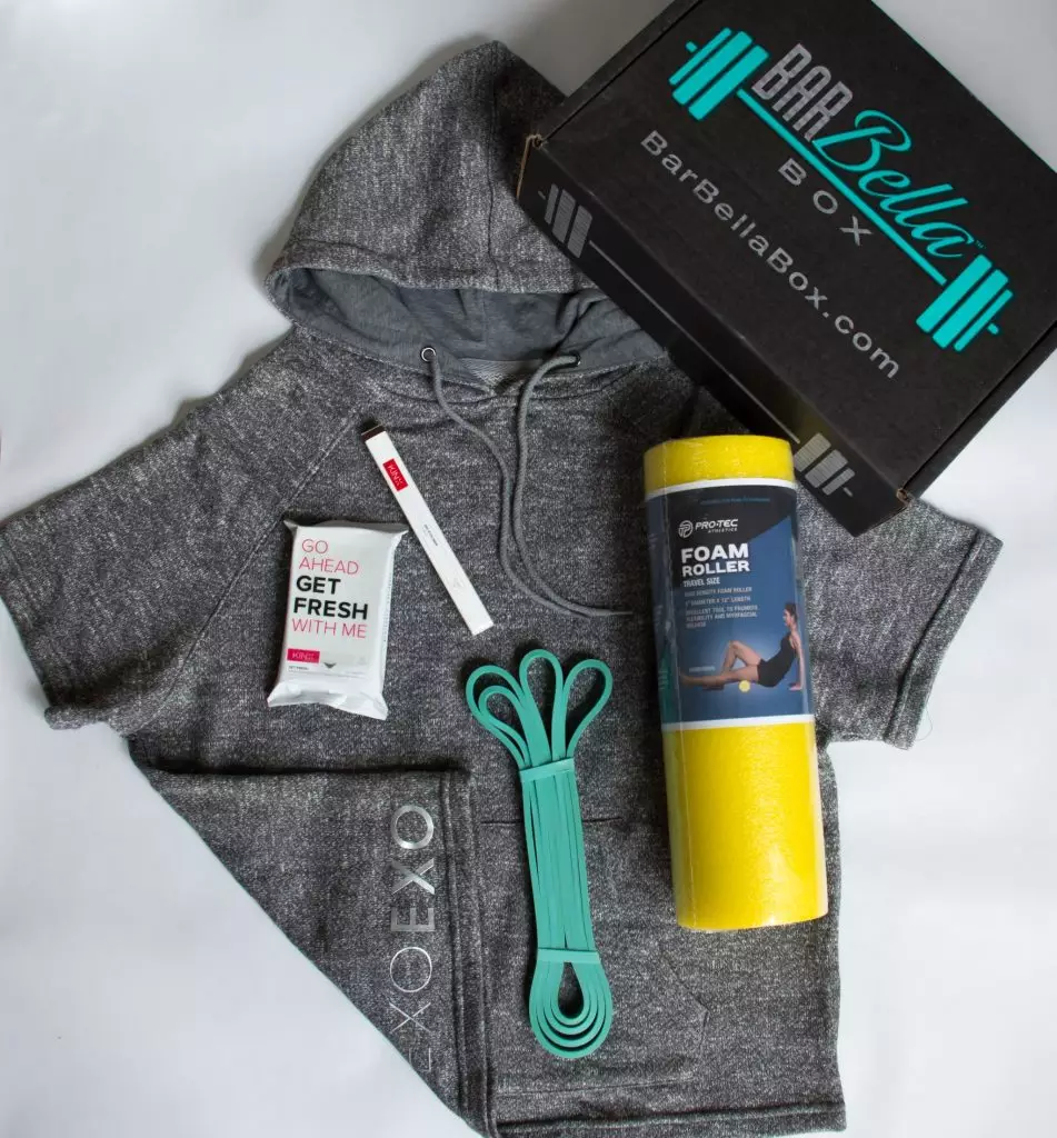 Barbella Box with workout apparel, a resistance band and personal-care products.
